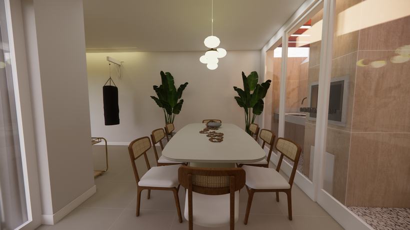 Mesa oval com vasos de folhagem e vidraça para a área externa