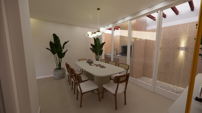 Mesa de jantar diante da vidraça de piso a teto com a área externa