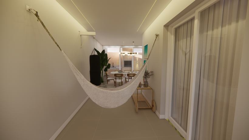 Espaço de descanso com rede, cortinas de linho e luz indireta
